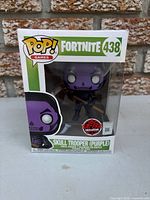 Front view of boxed Funko Pop showing figure, series, number and EB Exclusive sticker