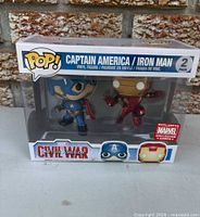 Front of sealed Funko Pop! 2-pack showing figures, branding and exclusive sticker