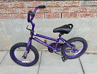 Full side view of purple 16-inch Infinity kids bike