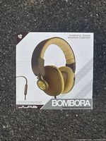 Front of retail box showing JLab Bombora headphones and branding