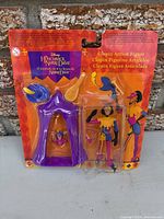 Front view of sealed Clopin action figure package with accessories visible