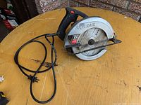 Full view of Skilsaw 5150 circular saw with attached cord and blade guard