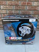 Front view of Thrustmaster NASCAR Pro Force Feedback 2 box
