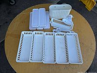 Full set laid out showing baskets, trays, soap dishes and caddies