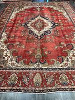 Full view of rug showing central medallion and borders