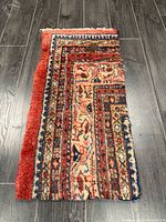 Full view of the rug showing overall pattern and colors