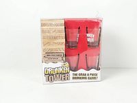 Front view of sealed Drunken Tower game set showing blocks and four shot glasses