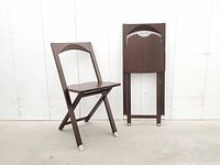 One chair open, one chair folded