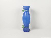 Full front view of blue frosted scavo glass vase with green applied wraps