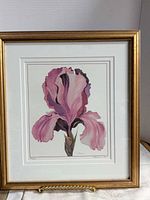 Full view of framed iris print showing gold frame, mat and artwork