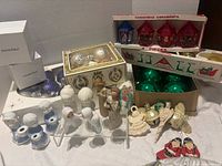 Overall lot showing Pandora boxes, Jewel Brite lanterns, Snowbabies, resin angel, assorted ornaments