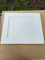 Front of white beadboard IKEA cabinet door panel