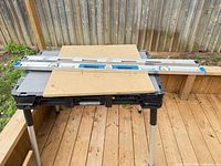 Two aluminum 48" levels on work table
