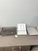 All three organizers on desk surface
