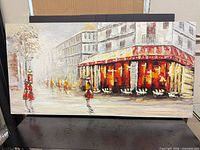 Full view of the acrylic cityscape painting on stretched canvas