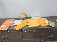 Overview of all packs and loose envelopes on cabinet