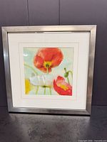 Front view of square framed botanical giclée print in silver metal frame