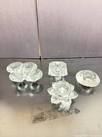 Group shot of the four clear glass/crystal tealight holders