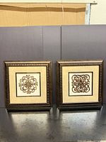 Front view of both framed wall art pieces