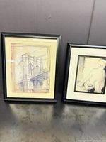 Both framed prints side by side