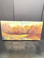 Front view of both 12x12 in autumn landscape canvas paintings
