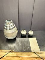 Overall view of vase, two candle holders, and tray showing colors, design, size relationship
