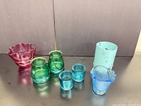 All six glass pieces grouped together on table