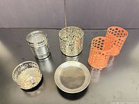 Group shot of all five votive holders and round tray