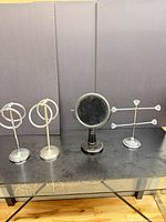 Full view of all four metal tabletop pieces