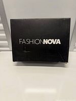 Fashion Nova branded shoe box
