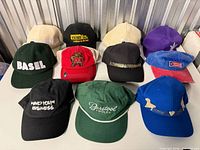 All 11 caps front view grouped