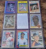 Full 3×3 binder page showing nine sleeved cards