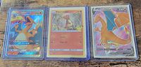 Front view of all three sleeved cards