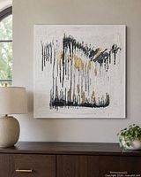 Painting hanging on wall above console