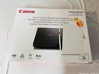 Front of Canon CanoScan LiDE 300 retail box showing product image and key specs