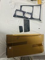 full set of three carbon-fiber pattern trim pieces with shipping box