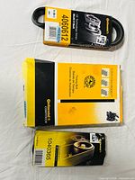 Three Continental belts in original packaging