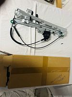 window regulator assembly atop original box