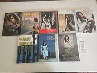 Front covers of all eight paperback books