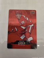 Front of 2020-21 Upper Deck Tim Hortons Red Die-Cut Dylan Larkin card
