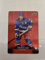 Front of 2020-21 Upper Deck Tim Hortons Red Die-Cut card featuring Mika Zibanejad