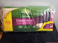 Front view of Depend for Women Underwear value pack showing size, count and branding