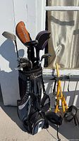 Full view of bag with clubs and pull cart
