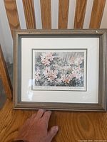 Front view of framed print showing artwork, matting and frame