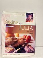 Front cover of Baking with Julia hardcover showing title, authors, bread imagery