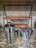 French press, moka pot and shelf together