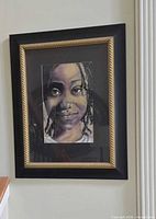 Framed portrait showing full artwork, frame and mat