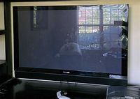 Front view of Pioneer plasma TV powered off