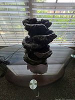 Front view showing entire tiered fountain and power cord