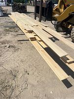 Stack of white pine V-joint boards strapped together
